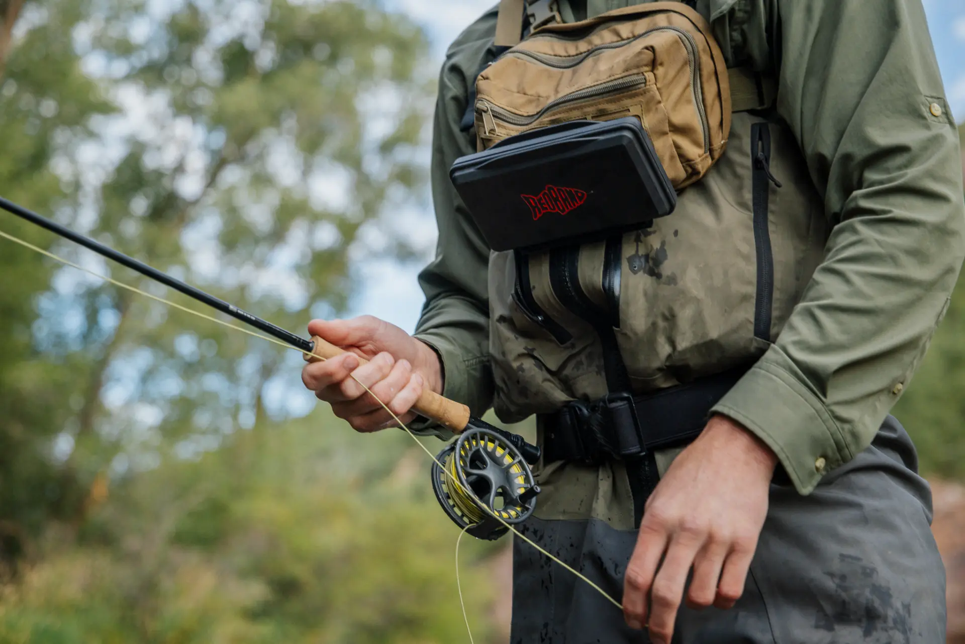 Redband Fly Box mounted to an angler's chest pack