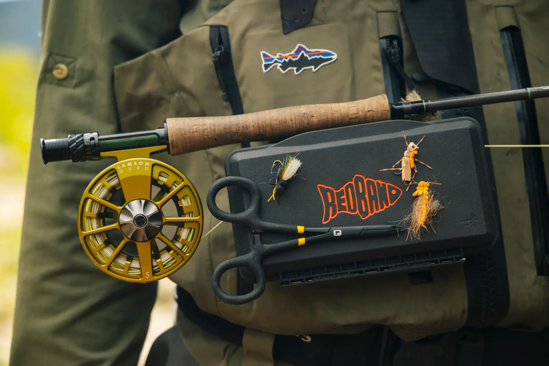 QuickDraw Magnetic Fly Box mounted to a fly angler's pack